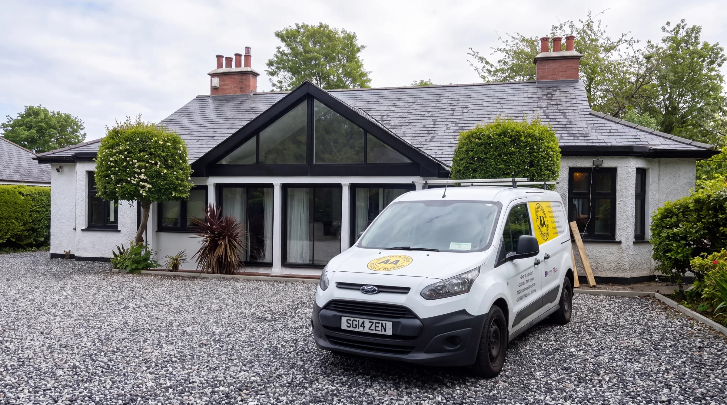 Full front elevation of The Gallop, Sutton — bespoke gable window and 6m sliding door