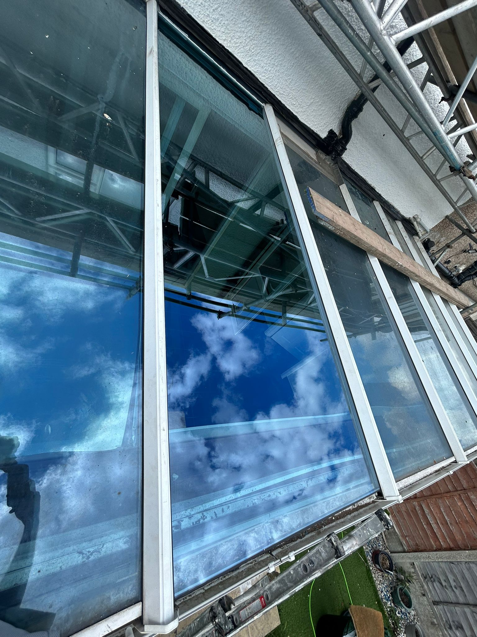 New laminated safety glass panels installed on conservatory roof, London